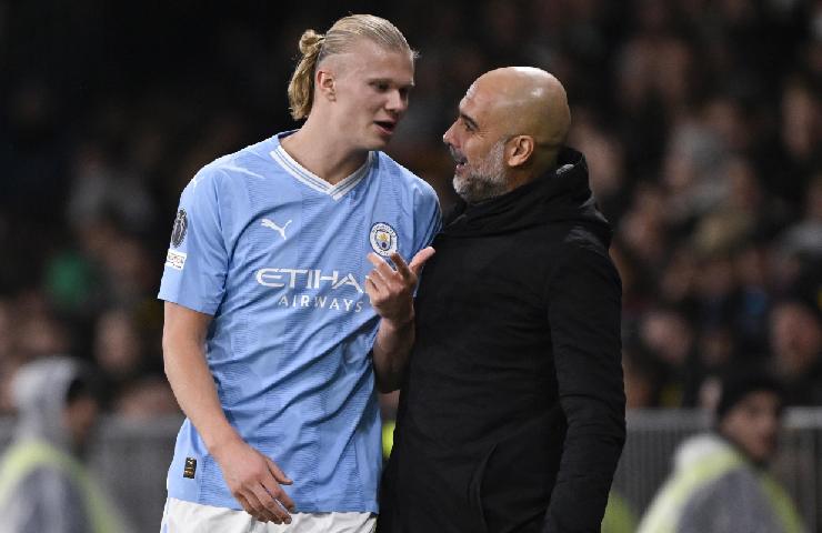 Erling Haaland e Pep Guardiola