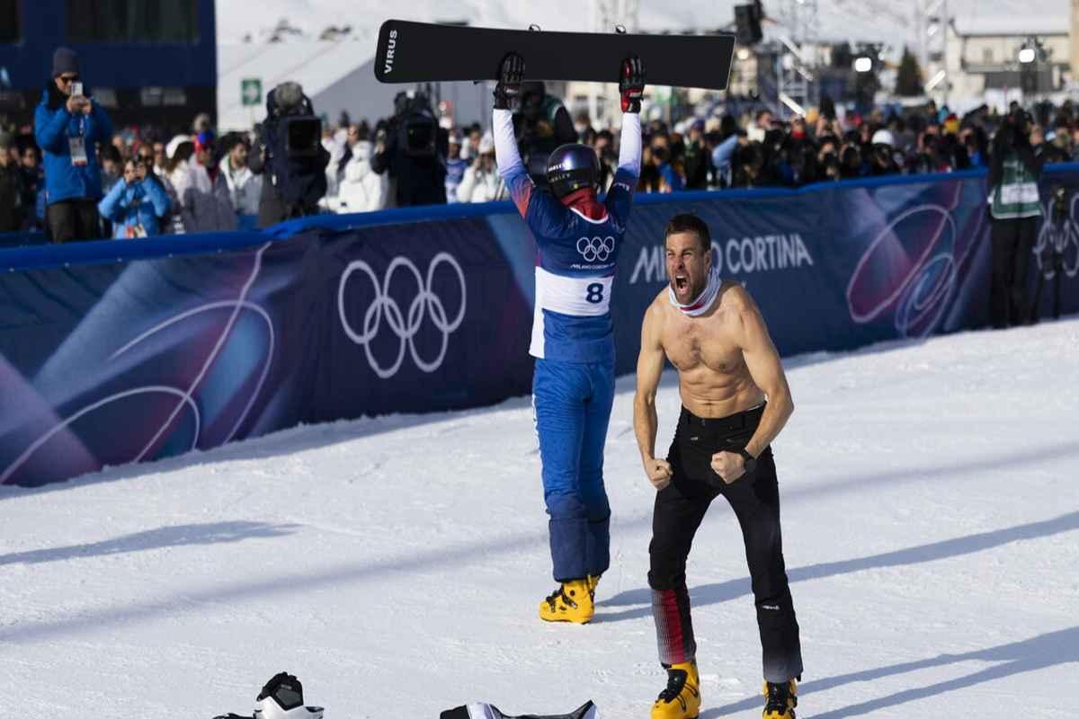 Karl festeggia con uno show da brivido: oro nello snowboard a torso nudo a Milano Cortina